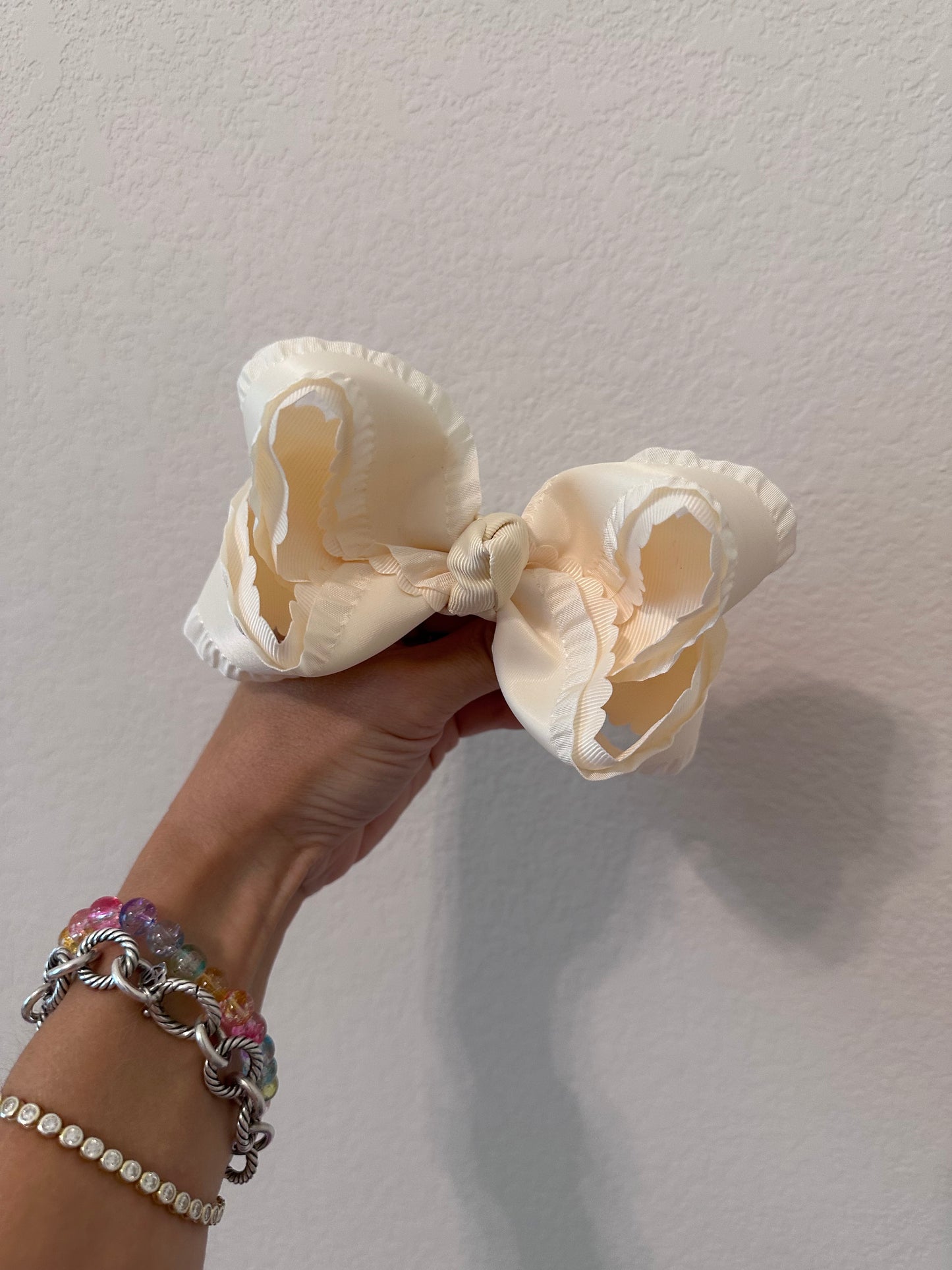 4” cream ruffle bow