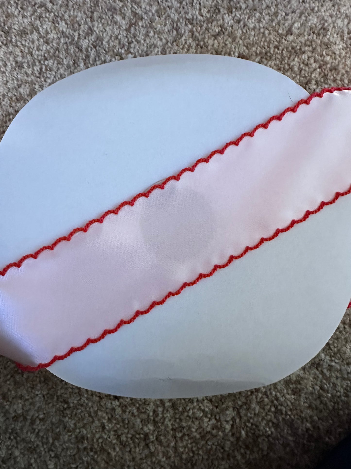 2” pearl pink satin with red stitch