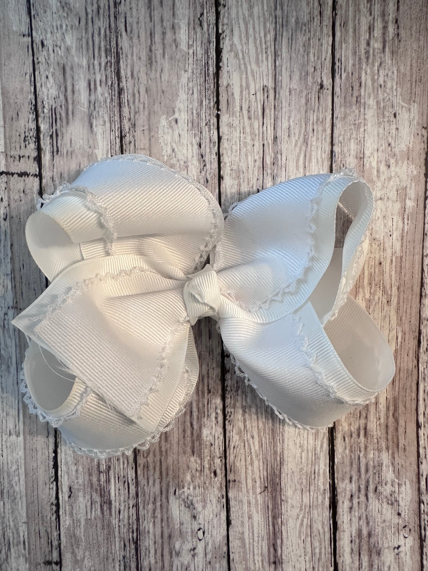 White layered Moonstitch Bow