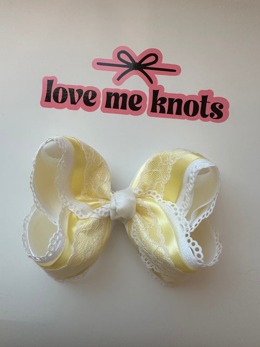 Yellow satin bow with lace